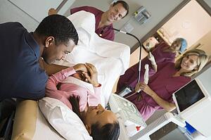 Doctor retrieving eggs from ovary using vaginal ultrasound