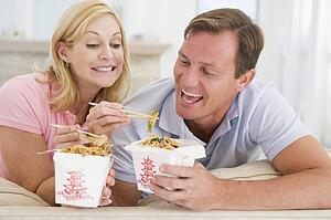 Couple Eating Takeaway meal, mealtime Together