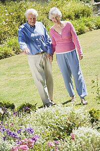 Senior couple in a flower garden