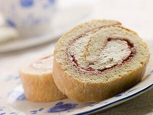 Cream and Strawberry Sponge Roll with Tea