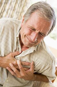 Man Clutching His Heart