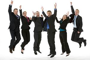 Group Of Business People Jumping In The Air 