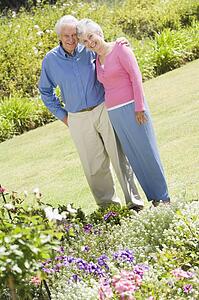 Senior couple in a flower garden