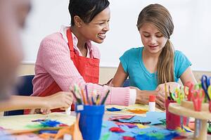 Teacher and student in art class (selective focus)