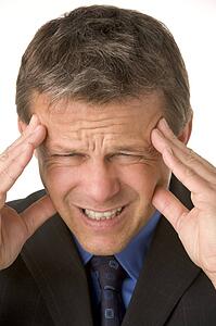 Businessman With Headache