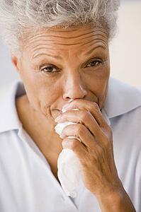 Woman Blowing Her Nose