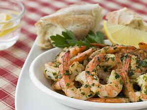 Dish of Garlic Buttered Tiger Prawns with Rustic Bread
