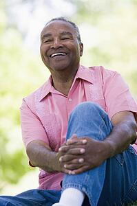 Senior man sitting outdoors