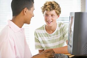 Teenage Boys Using Desktop Computer 