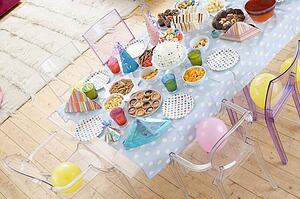 Birthday party table setting with food
