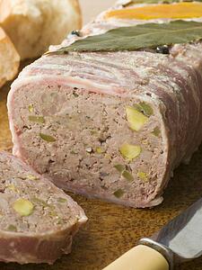 Pate Campagne on a Chopping Board with Rustic Bread