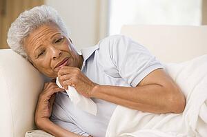 Woman Blowing Her Nose