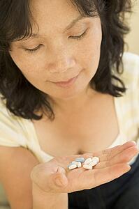 Woman Taking Pills
