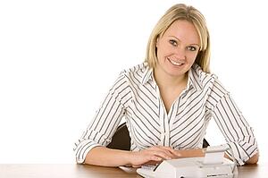 Businesswoman Using Calculator 