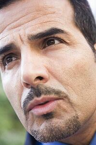 Businessman's face outdoors (selective focus)