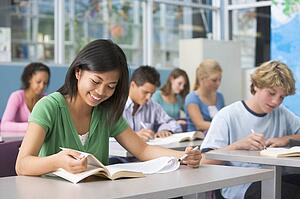 Students studying in geography class