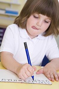 Student in class learning numbers (selective focus)