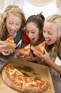 Teenage Girls Eating Pizza 