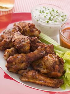 Spicy Buffalo Wings with Blue Cheese Dip Celery and Hot Chilli Sauce