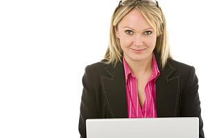 Businesswoman Sitting In Front Of Laptop 