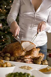 Carving Christmas Roast Turkey with all the Trimmings