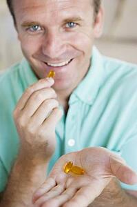 Man Taking Pills