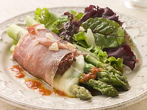 Roasted Asparagus spears with Mozzarella Cheese and Sun Dried Tomatoes wrapped in Prosciutto