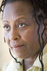 Head shot of woman scowling