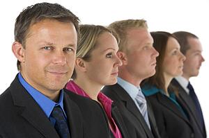 Group Of Business People In A Line Looking