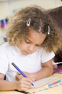 Student in class learning numbers (selective focus)