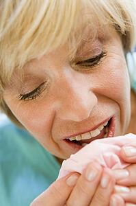 Woman Sneezing