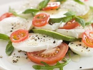 Tomato Avocado and Mozzarella Salad with Olive Oil and Black Pepper