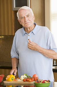 Man Cutting Up Vegetables 
