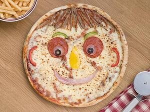 Smiley Faced Pizza with a Portion of Chips