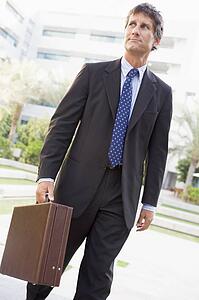 Businessman walking outdoors