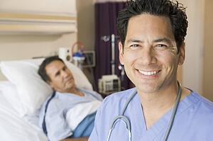 Doctor Smiling In Patients Room
