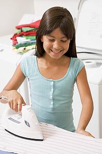 Young Girl Ironing 