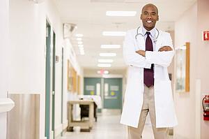 Doctor Standing In A Hospital Corridor