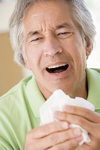Man Blowing His Nose