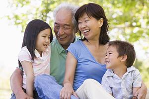 Grandparents laughing with grandchildren.