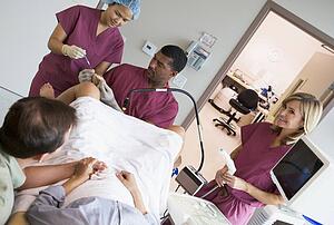 Doctor retrieving eggs from ovary using vaginal ultrasound