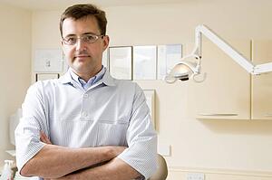 Dentist in exam room