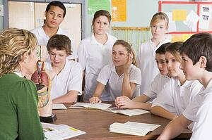 Students receiving a biology lesson in classroom