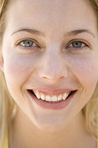 Head shot of woman smiling