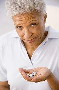 Woman Taking Pills