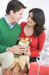 Husband Surprising Wife With Christmas Present
