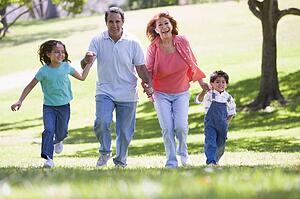 Grandparents running with grandchildren.