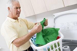 Man Reading Washing Instructions