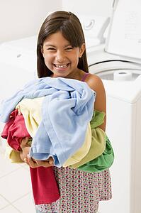 Young Girl Doing Laundry