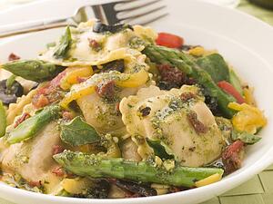 Roasted Vegetable Ravioli with Pesto Dressing Sun Blushed Tomatoes and Asparagus
